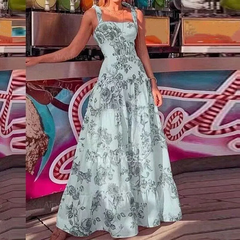 Claudia - Maxi dress with floral print.